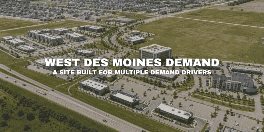 Aerial view of Pavilion Park in West Des Moines with modern mixed-use buildings, commercial pads, office and residential elements, broad roads, open land, and nearby interstate access.