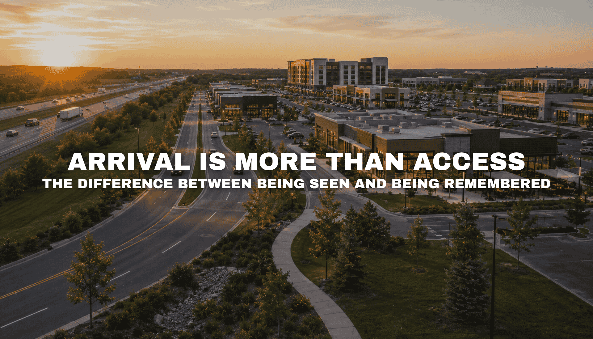 Golden-hour view of Pavilion Park in West Des Moines, Iowa with broad roads, landscaped entrances, modern commercial buildings, parking, and I-80 access creating a strong arrival experience.
