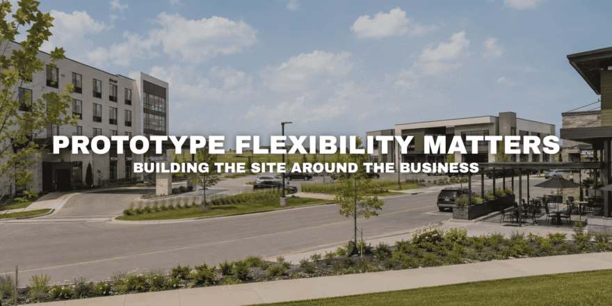 Street-level view of Pavilion Park in West Des Moines, Iowa with modern office, hospitality, retail, and restaurant buildings, landscaped roads, open parcels, and room for flexible commercial development.