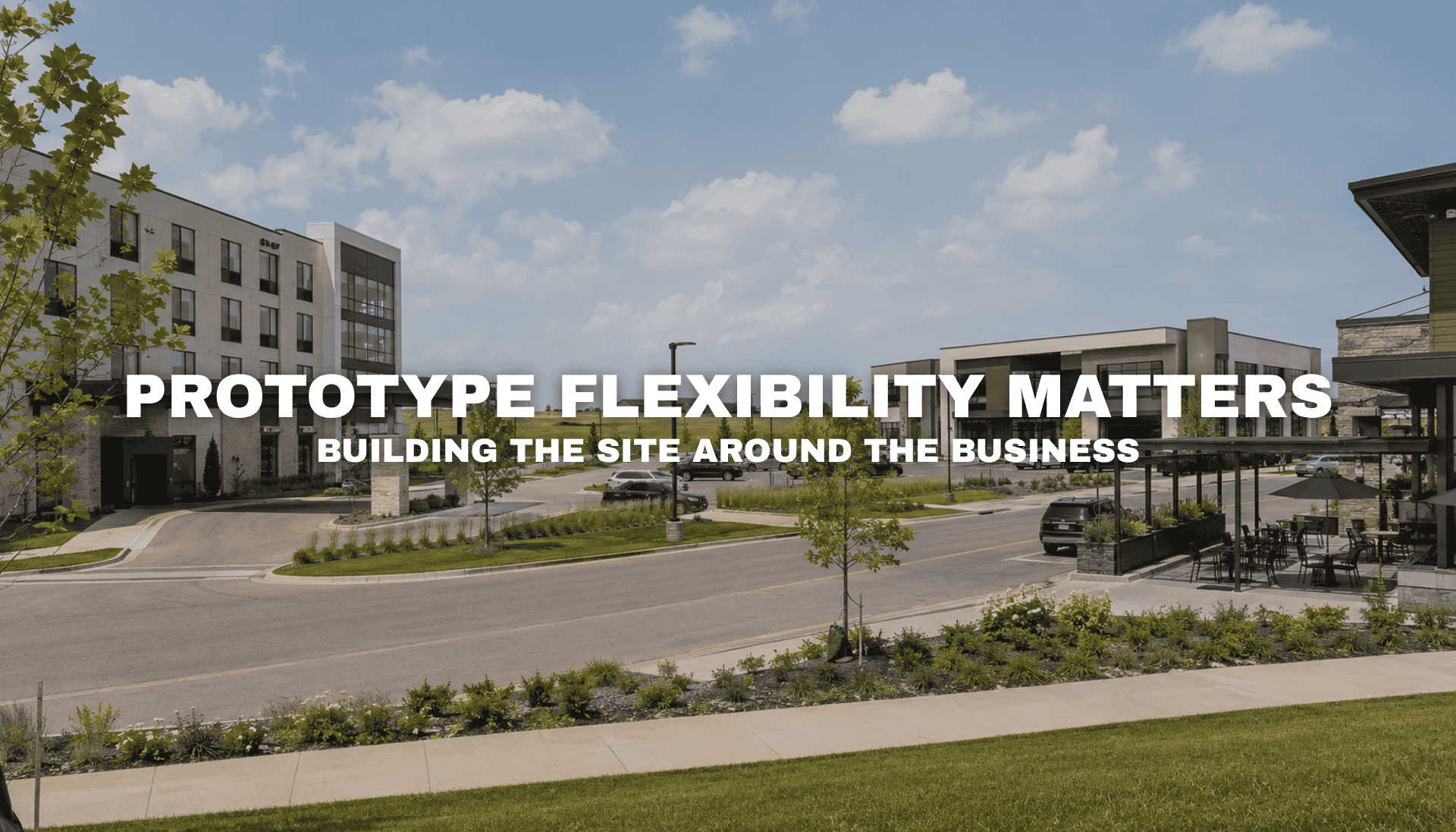 Street-level view of Pavilion Park in West Des Moines, Iowa with modern office, hospitality, retail, and restaurant buildings, landscaped roads, open parcels, and room for flexible commercial development.